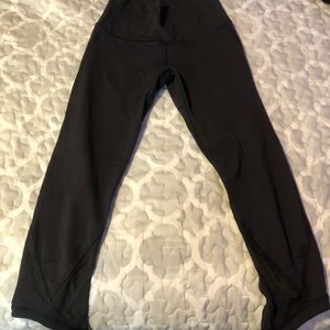 Black Lululemon Leggings with mesh detailing